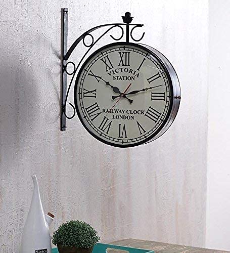 London Victorian-style double-sided railway station clock